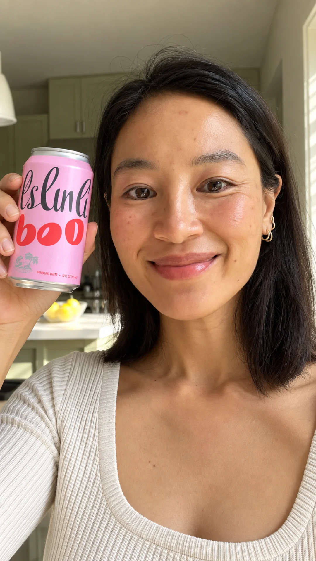 Lifestyle ad made with Klaspr for a pink sparkling-water can